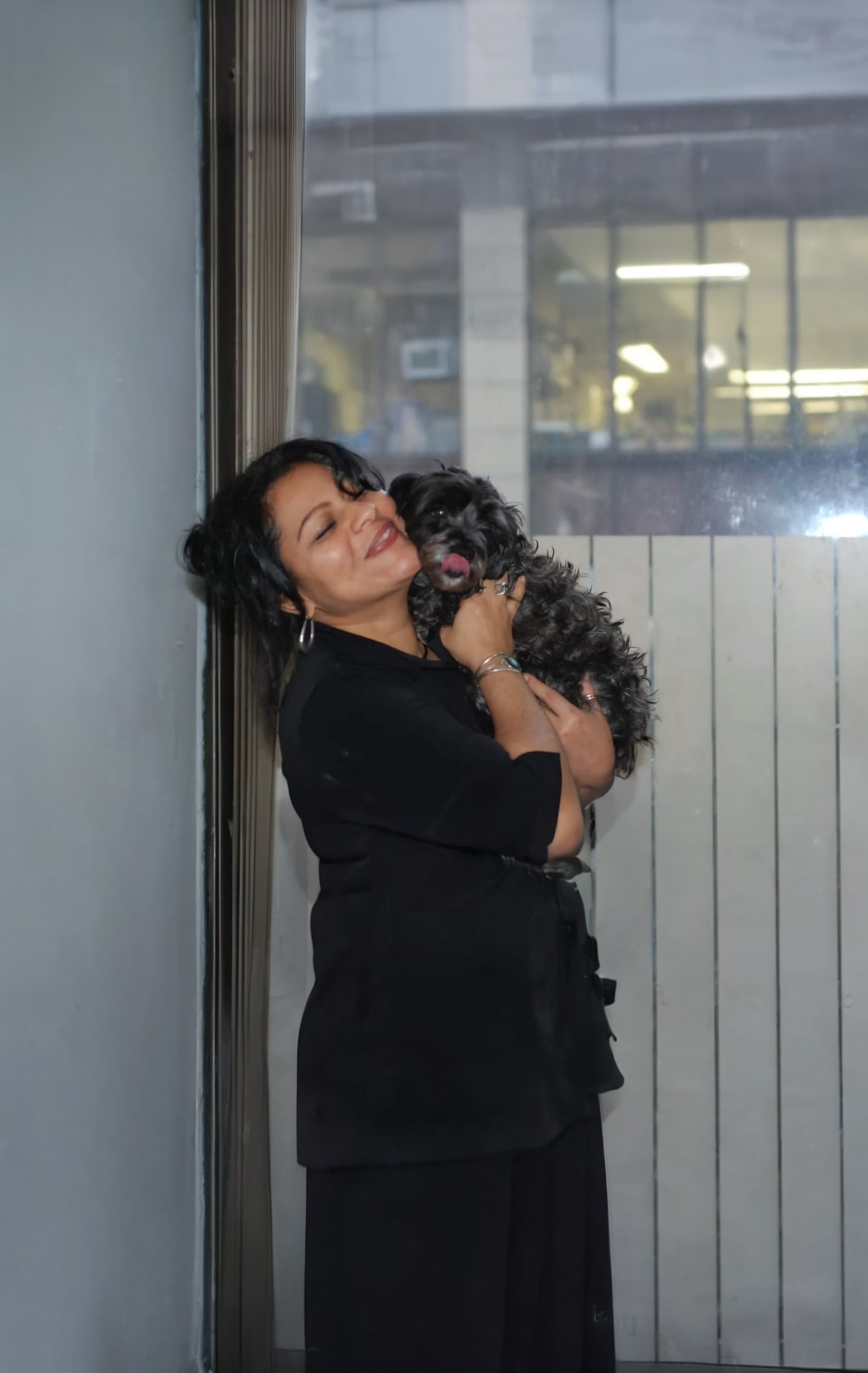 Founder of Wiggletail & Co. with her dog